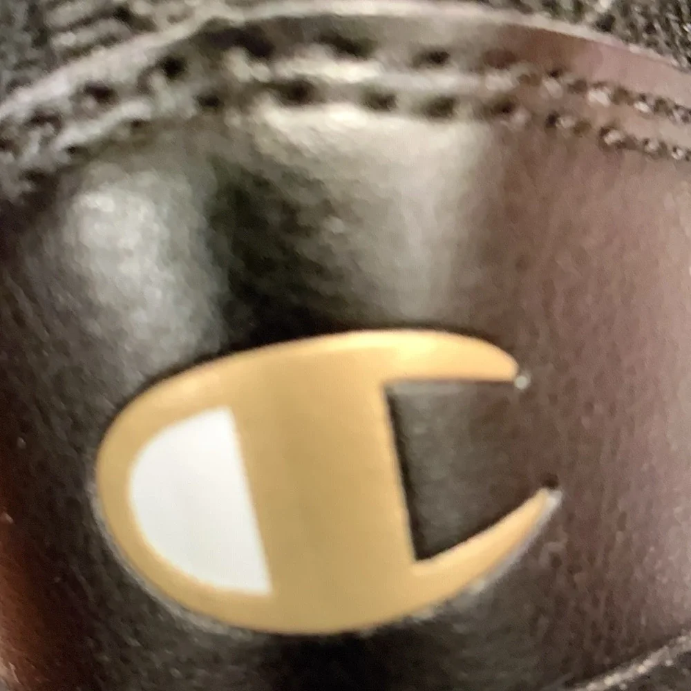 Champion Black and Gold Slip-On Sneakers Sleek Design, size 7